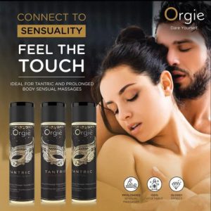 Luxury Tantric Massage Oil product image Promotional banner featuring a man and woman with the text "Sensuality, feel the touch," emphasizing intimacy and connection.