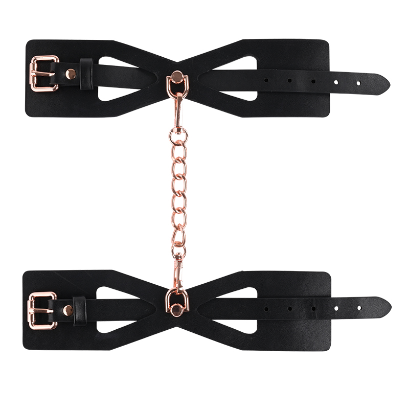 California Exotics Brat Handcuffs Rose Gold Sassy Handcuffs product image Sportsheets Brat Handcuffs open showing premium black faux leather straps