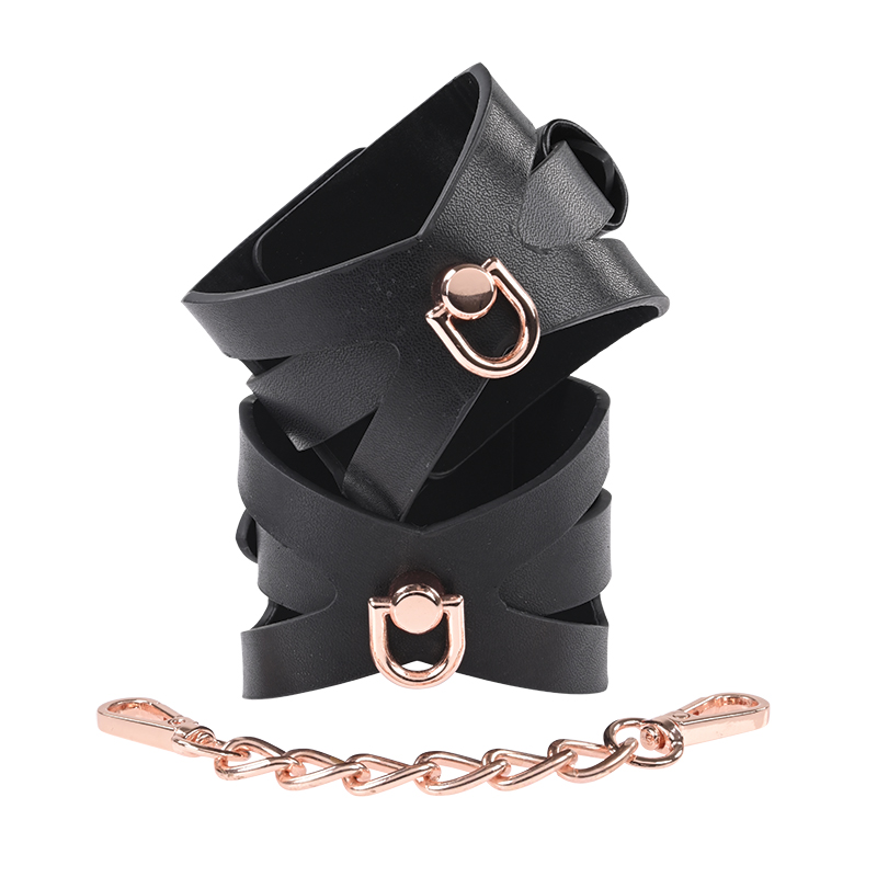 California Exotics Brat Handcuffs Rose Gold Sassy Handcuffs product image Close up of Sportsheets Brat Handcuffs stacked showing corset cutouts