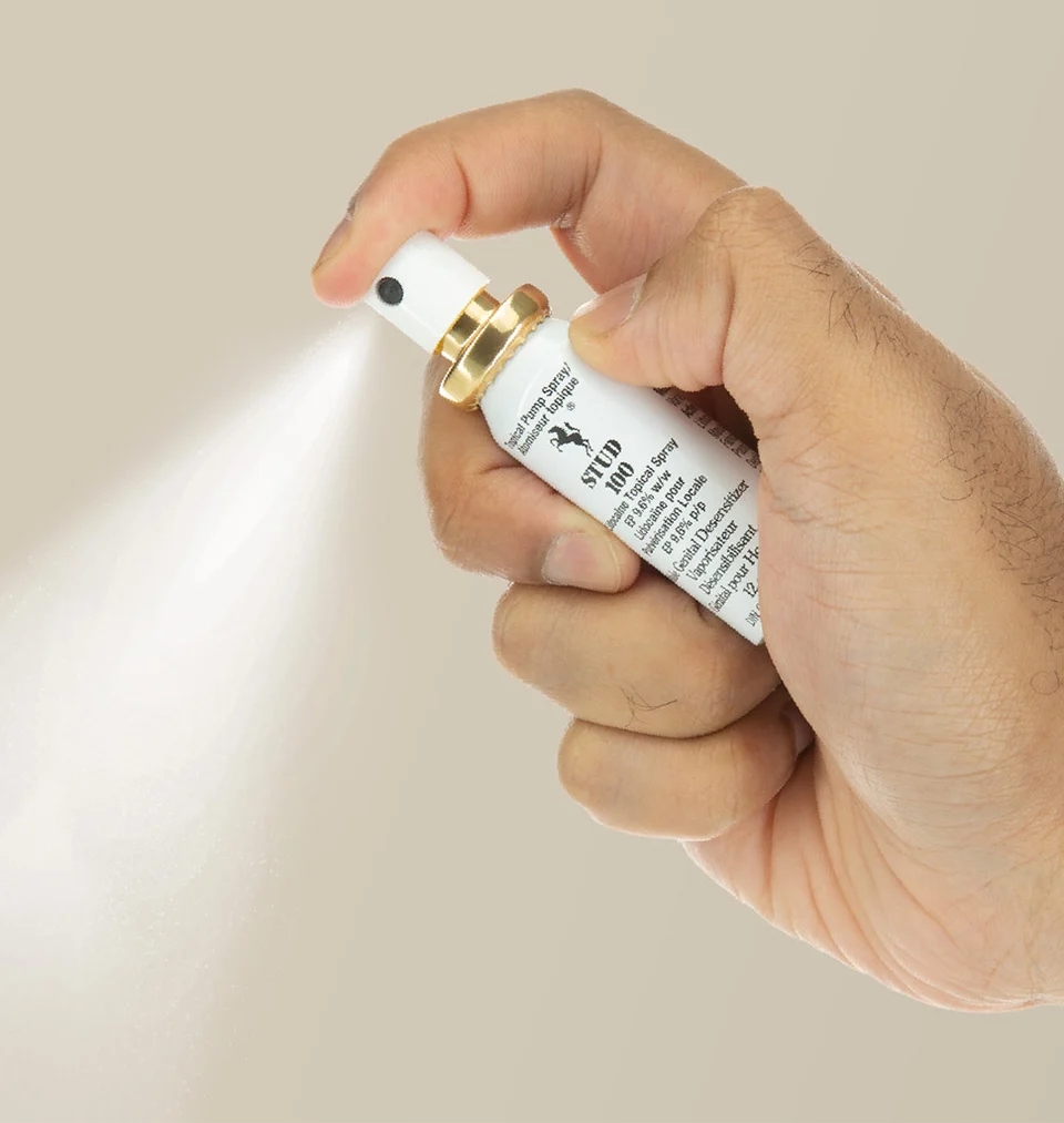 Stud 100 Delay Spray for Men - 12g product image Close-up view of a hand demonstrating how to use the Stud 100 spray.