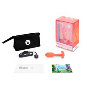 b-Vibe Vibrating Snug Plug S Orange product image Unboxing layout showing the Vibrating Snug Plug 1, USB charging cable, travel storage bag, and guide book.