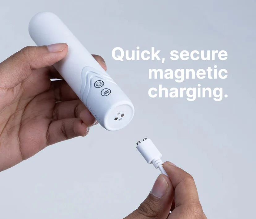 Illumination THE Bullet App Controlled LED Vibrator product image Quick secure magnetic USB charging cable connecting to the base of the Illumination mini bullet vibe