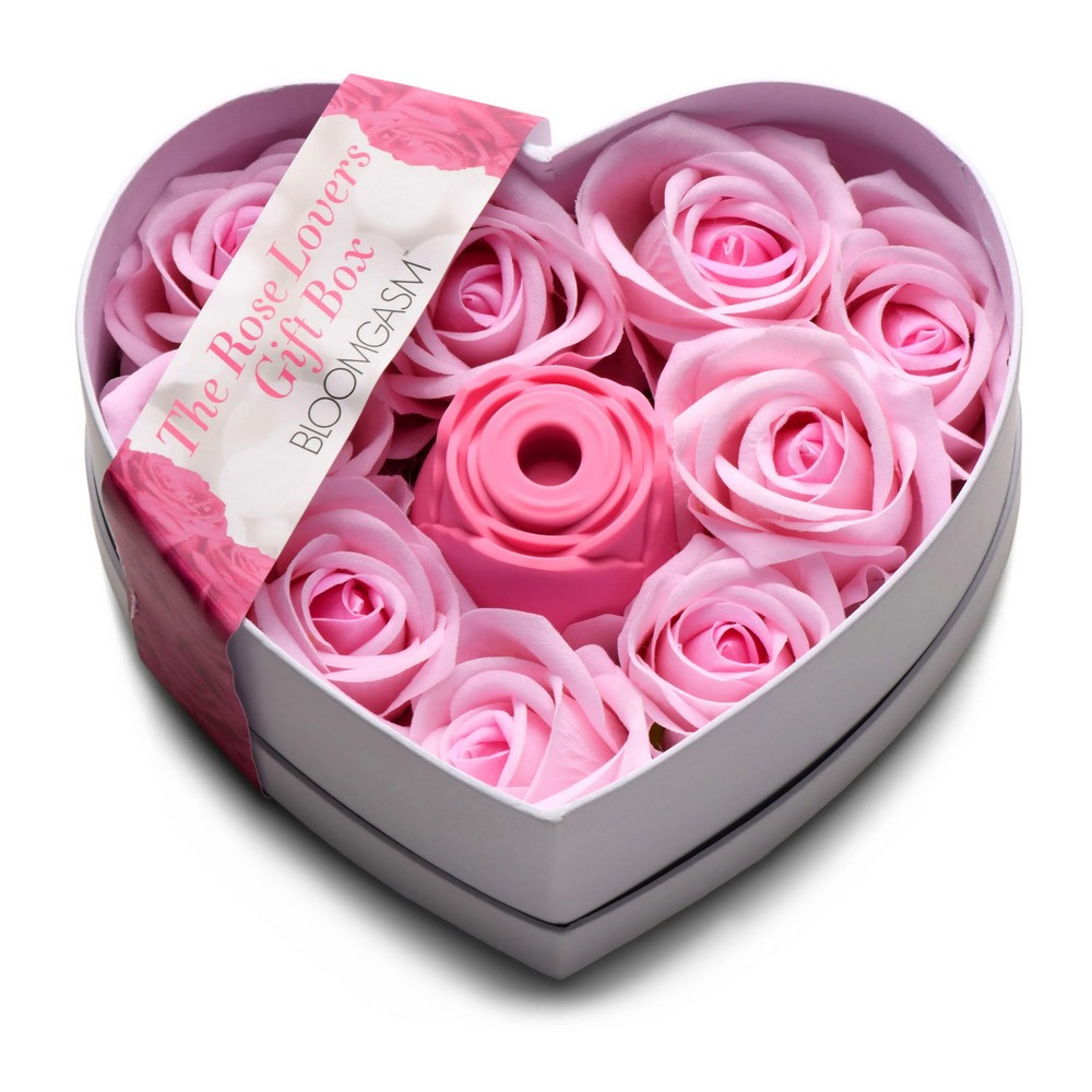 Rose Lovers Gift Box Pink product image Rose Lovers Gift Box Pink displayed open, showcasing the black air-pulse rose toy nestled inside a heart-shaped box of pink everlasting roses.