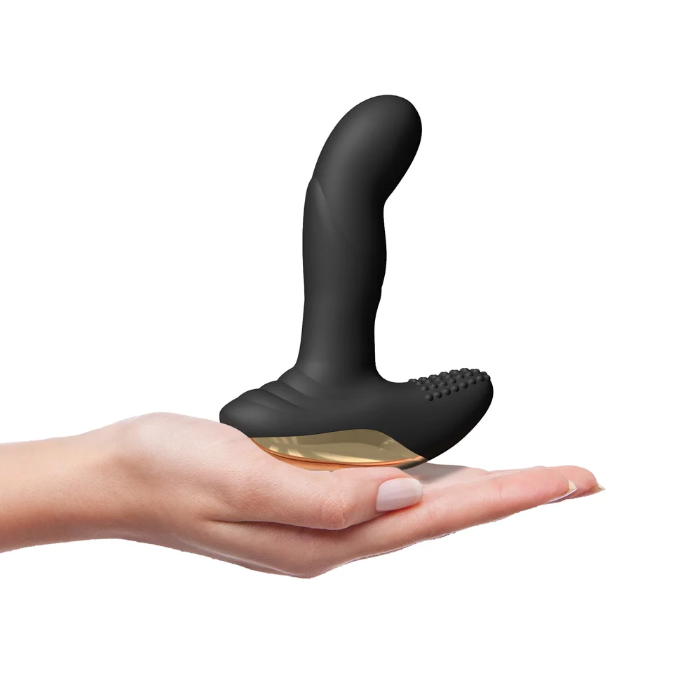 Dorcel P-Finger Remote Control Vibrator product image Hand resting the ergonomic Dorcel P-Finger prostate stimulator in the palm to highlight scale and curved shape.
